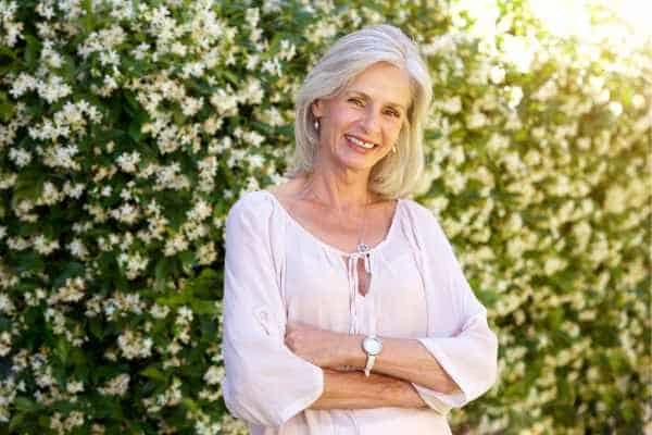 Older woman happy with urinary incontinence treatment Farnham